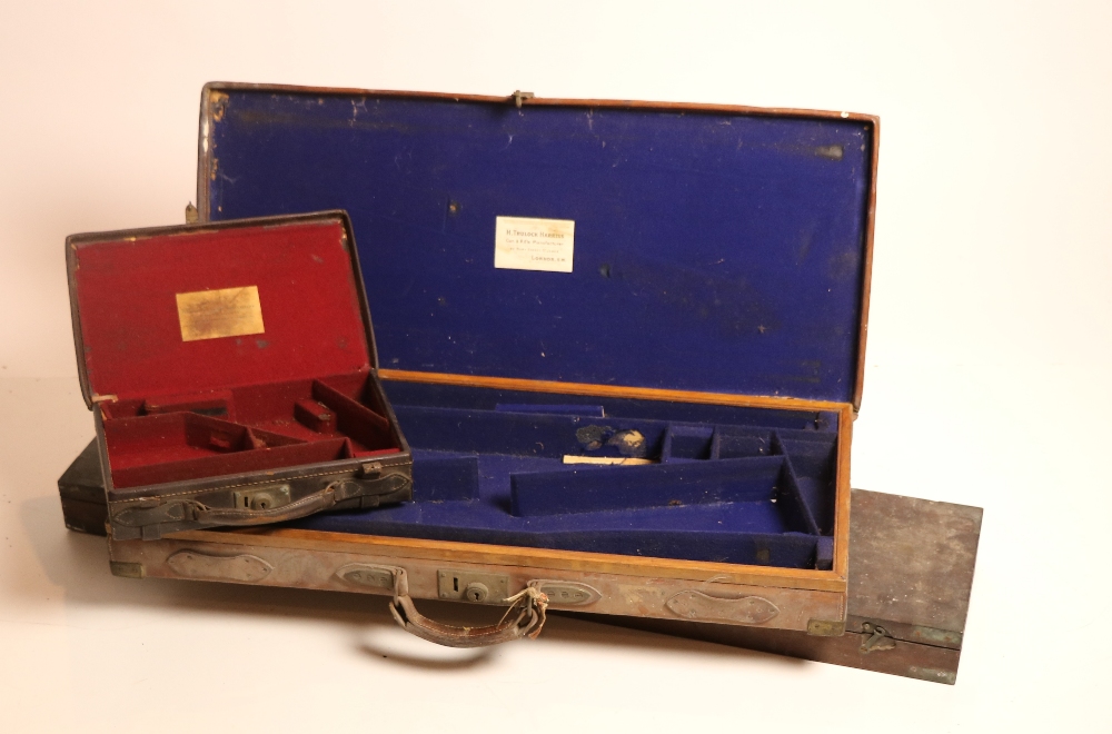 A good brass bound leather Gun-Case for a pair of shotguns, labelled 'H.