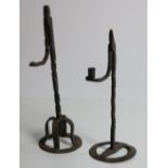 Two similar antique Irish wrought iron Rush Lights.