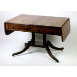 A 19th Century mahogany Sofa Table, in the manner of Duncan Phyfe,