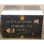 An antique large tin bound wooden Military Trunk, inscribed 'Capt. K. Alexander, XI Hussars P.A.O.