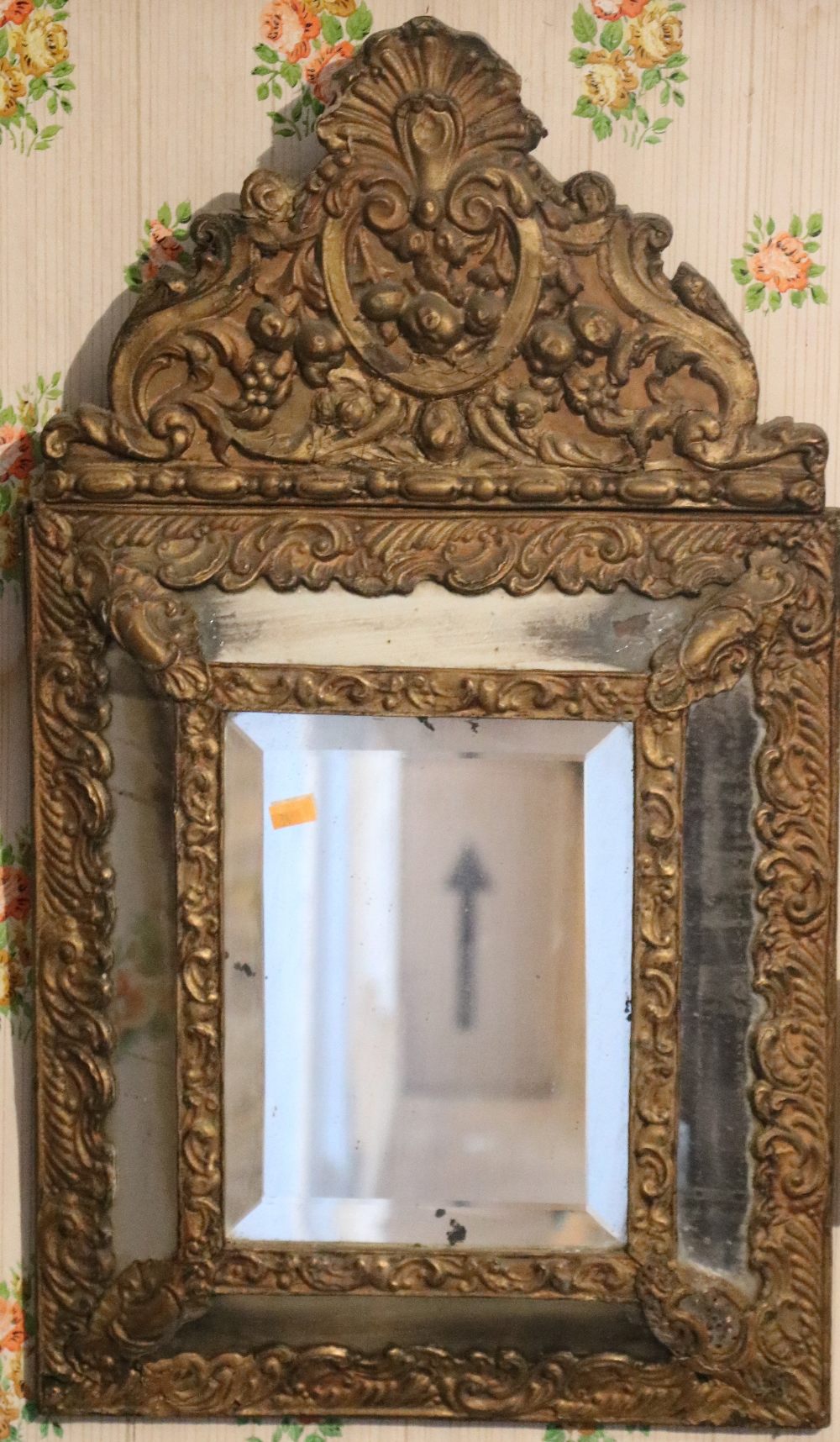 A Victorian embossed brass cushion frame Wall Mirror,