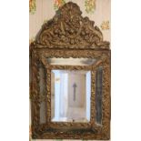 A Victorian embossed brass cushion frame Wall Mirror,