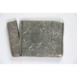 A silver Card Case, Birmingham 1902 chased with scrolling foliage, 2 3/4" (9.5cms), 68gr.