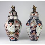 A fine pair of large and attractive late 17th Century Imari Edo period octagonal Vases and covers,