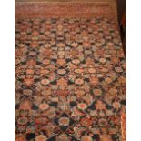 A large blue ground and floral decorated Oriental Carpet,