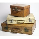 A collection of varied old leather and vellum Travel Cases, a rectangular steel bound Trunk, etc.