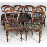 A set of 18 Irish Victorian mahogany balloon back Dining Chairs, by Jones & Co.