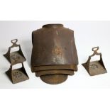 An antique heavy iron Lobster tail Armour back Plate, and a pair of heavy antique iron Stirrups,