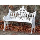 A pair of Victorian style cast iron Garden Benches, with ornate back and pierced seats, each approx.