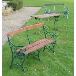 A pair of metal and wooden Garden Benches, with scroll arms, together with matching trestle Table.