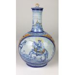 An attractive late 19th Century blue, white & orange bulbous Faience Jar & Cover,