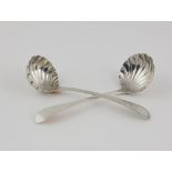 An attractive George III English silver Sauce Ladle, with bright cut handle and shell bowl,
