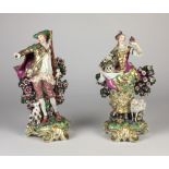 A mid-18th Century pair of gold anchor tall Chelsea Figures, elegant Lady and Gent,