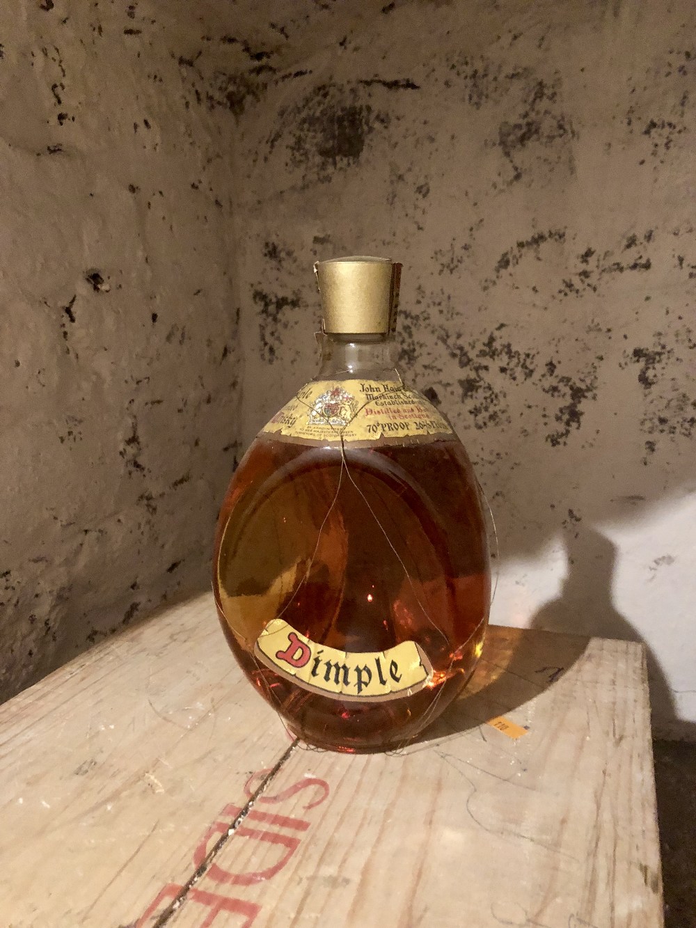 Whiskey: a Dimple Haig Scotch Whiskey 30+ years old.