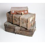 A collection of wooden leather and tin Trunks, cases, boxes, etc., some inscribed 'Alexander'.