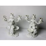 A pair of 19th Century Meissen blanc-de-chine porcelain figural Candelabra,