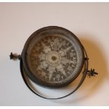 A 19th Century Ship's Compass, with decorative engraved dial.