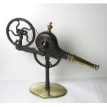 A 19th Century heavy steel and brass mechanical Fire Bellows, on stand.
