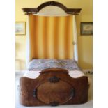 A Victorian walnut half tester 5' Bed, the arched top with carved central decoration,