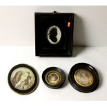 A large collection of ebonised square and oval miniature Frames, and other small frames.