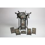 A 19th Century Oriental carved and pierced hexagonal Hall Lantern, with painted glass panels,
