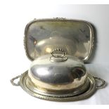 A large oval plated Tray, and a rectangular ditto, and two plated Dish Covers. As a lot.