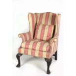 An attractive 19th Century mahogany framed wing back Armchair,