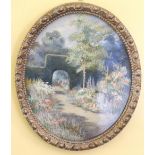 An attractive oval Needlework, depicting a walled garden with colourful flowers etc.