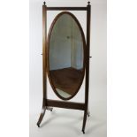 A 19th Century inlaid oval mahogany Cheval Mirror,