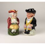 A tall Victorian Staffordshire Figure, "Queen of Prussia," 41cms (16")high and a pair of Toby Jugs,