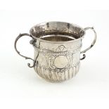 A good early George II English silver two handled Porringer, of plain fluted and half reeded form,