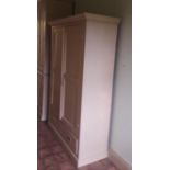 A very large painted deal Estate Cupboard, with four double panelled doors on top,