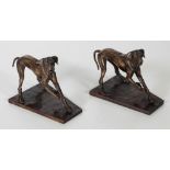 Sally Arnup (1930 - 2015) An attractive pair of heavy bronze Hunting Dogs on shaped bases,