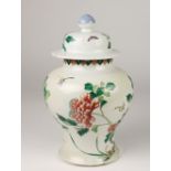 A very good early 19th Century Chinese Famille Rose Vase & Cover, of bulbous form,