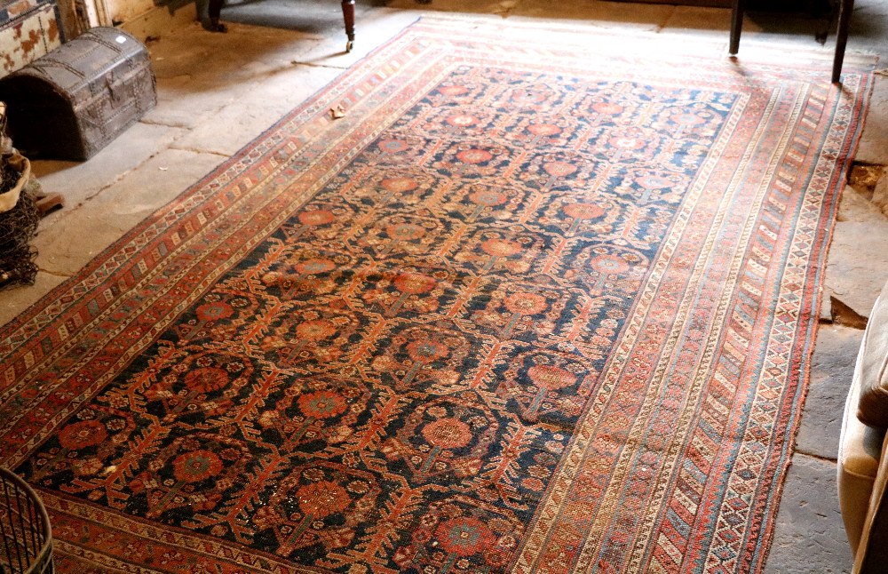 An old 19th Century Oriental Rug, approx. 366cms x 190cms (12' x 6'3"). - Image 2 of 3