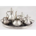 A fine extensive English Victorian silver Presentation Tea Service, teapot, coffee pot,