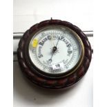 ROUND CARVED BAROMETER APPROX D: 9"