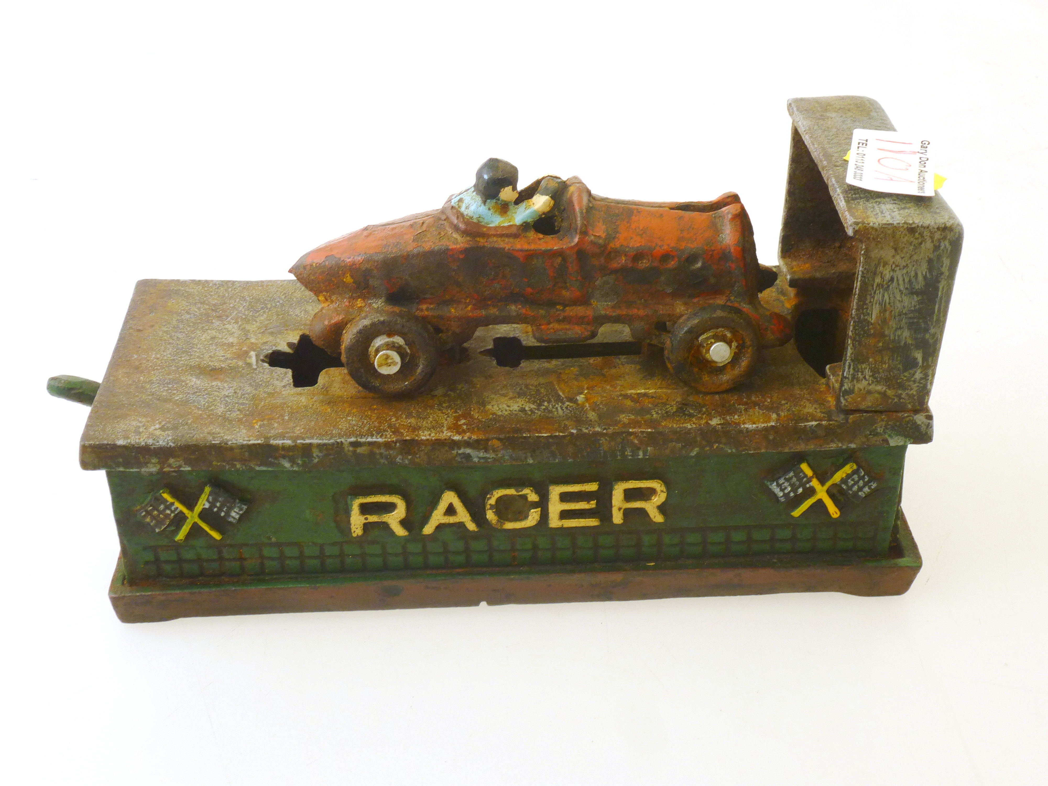 A GOOD 1920S CAST IORN AND PAINTED 'RACER' MONEY BOX, MOUNTED WITH A BUGATTI AND DRIVER, ON SPRING - Image 2 of 6