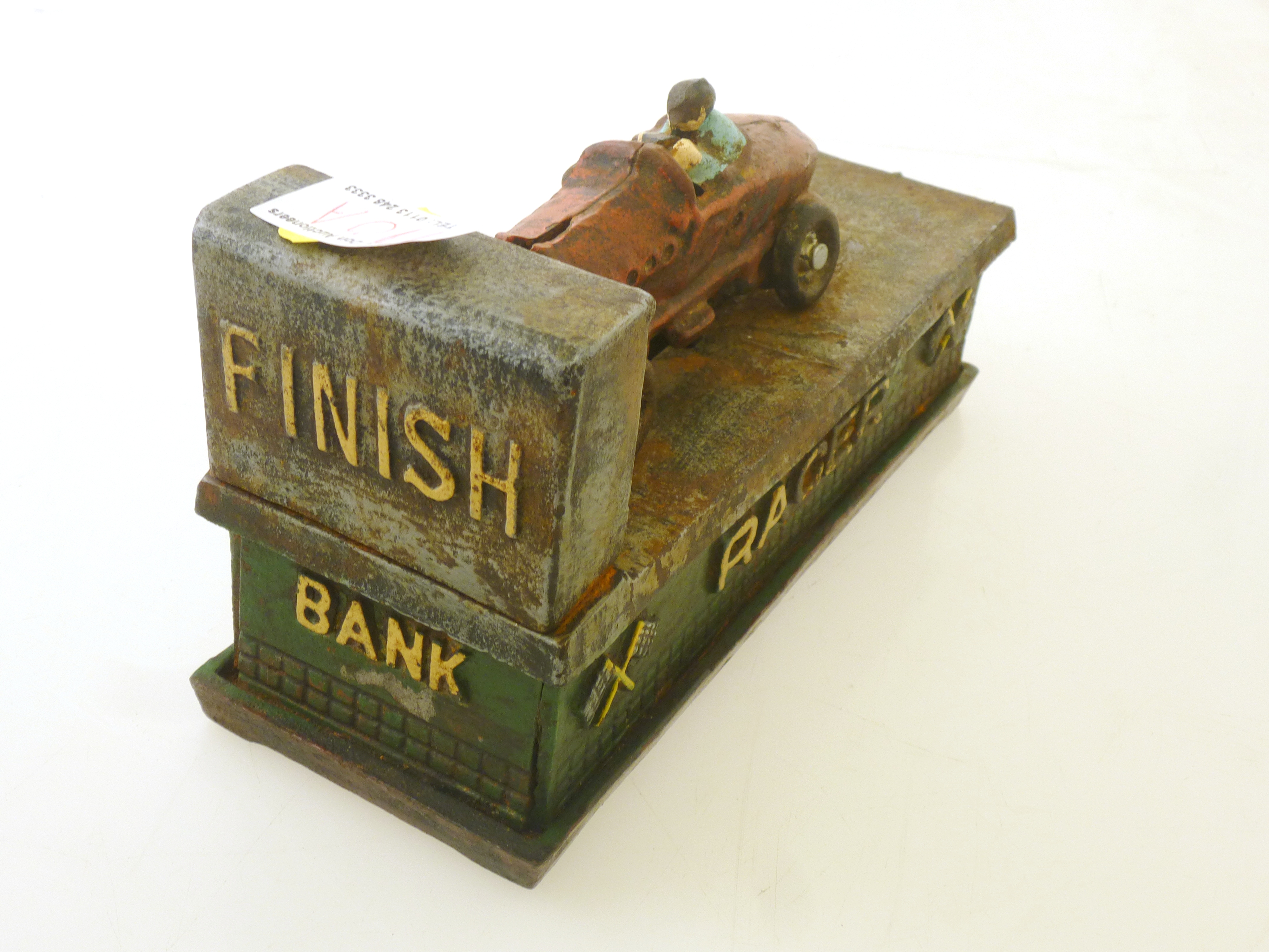 A GOOD 1920S CAST IORN AND PAINTED 'RACER' MONEY BOX, MOUNTED WITH A BUGATTI AND DRIVER, ON SPRING - Image 5 of 6