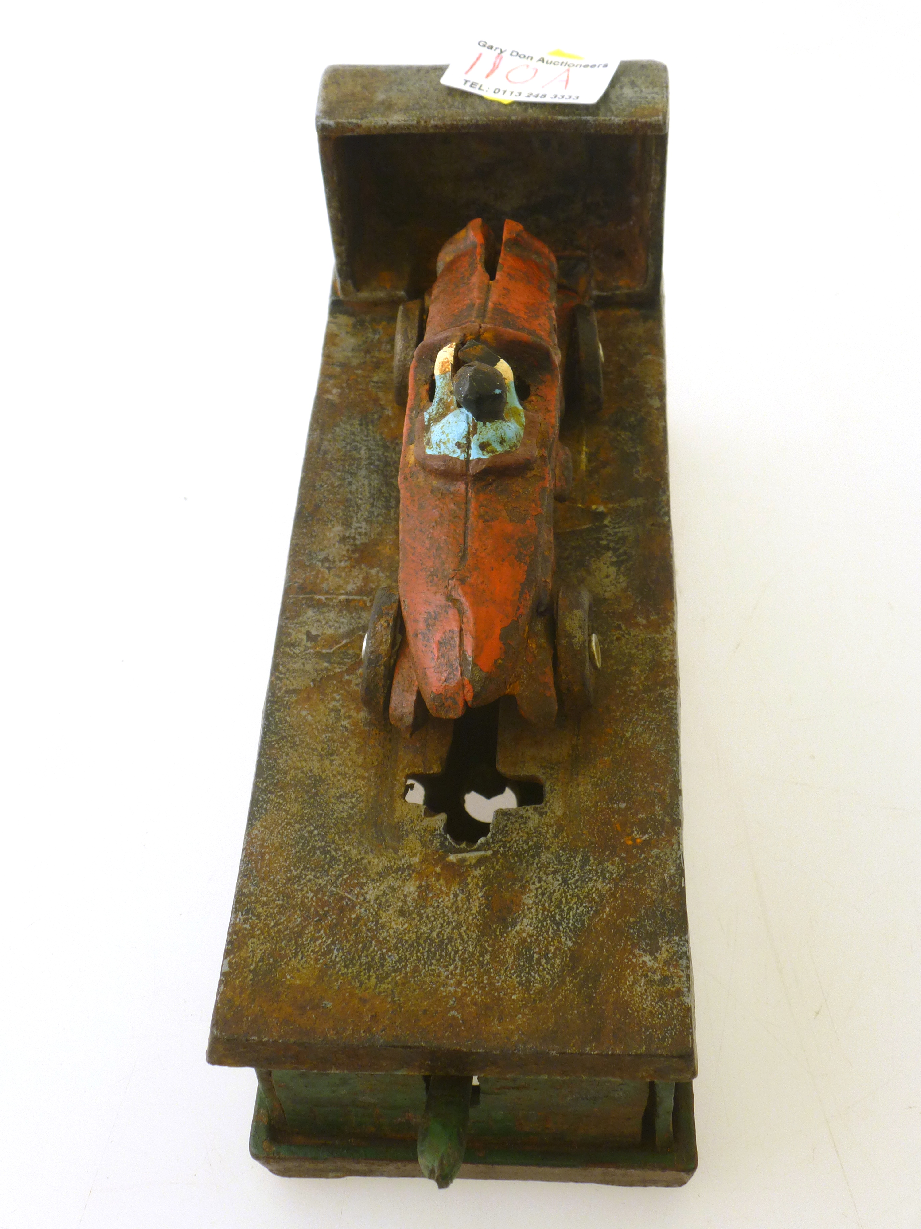 A GOOD 1920S CAST IORN AND PAINTED 'RACER' MONEY BOX, MOUNTED WITH A BUGATTI AND DRIVER, ON SPRING - Image 4 of 6