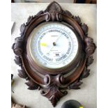 J. CASARTELLI, MANCHESTER CARVED BAROMETER APPROX 21" X 16"