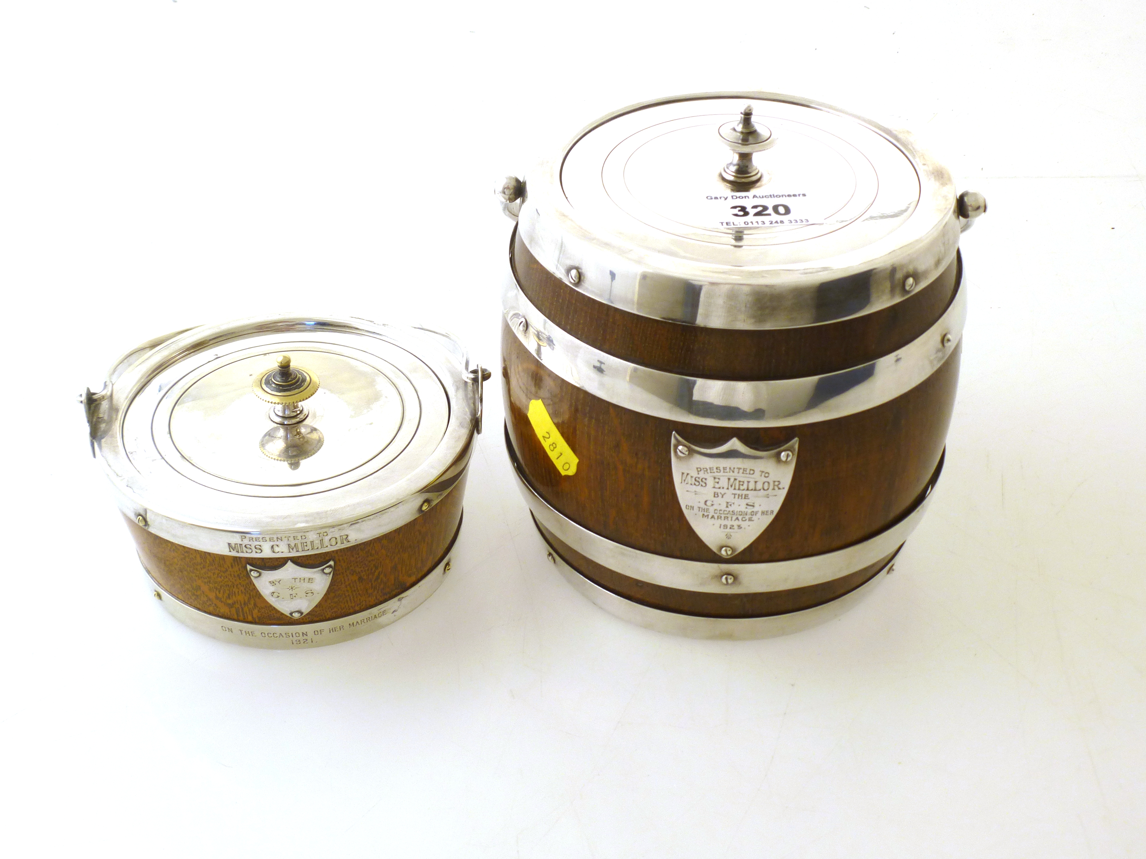 2 BISCUIT BARRELS PRESENTED TO E. MELLOR AND C. MELLOR