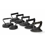 Set of five 'Silvesters patent' convex bottom irons, in graduated sizes one through to five, the