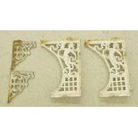 Pair of decorative painted cast iron brackets, with relief cast maiden figures to the detail,