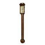 Mahogany stick barometer, the silvered scale signed Joseph Veduzzy & Co, over a flat canted trunk to