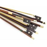 Five various bows and a bow stick (6)