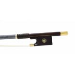 Fine and interesting gold mounted violin bow stamped C. Thomassin á Paris, the stick round, the