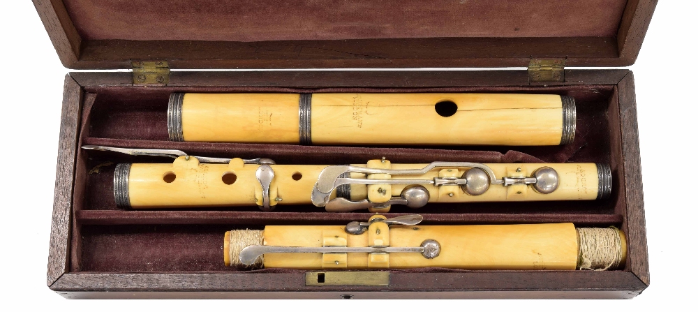 19th century English ivory seven key flute by and stamped A. Kauffmann, London, within a wooden case