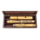 19th century English ivory seven key flute by and stamped A. Kauffmann, London, within a wooden case