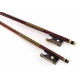 Silver mounted violin bow, unstamped; also a nickel mounted unstamped violin bow (2)
